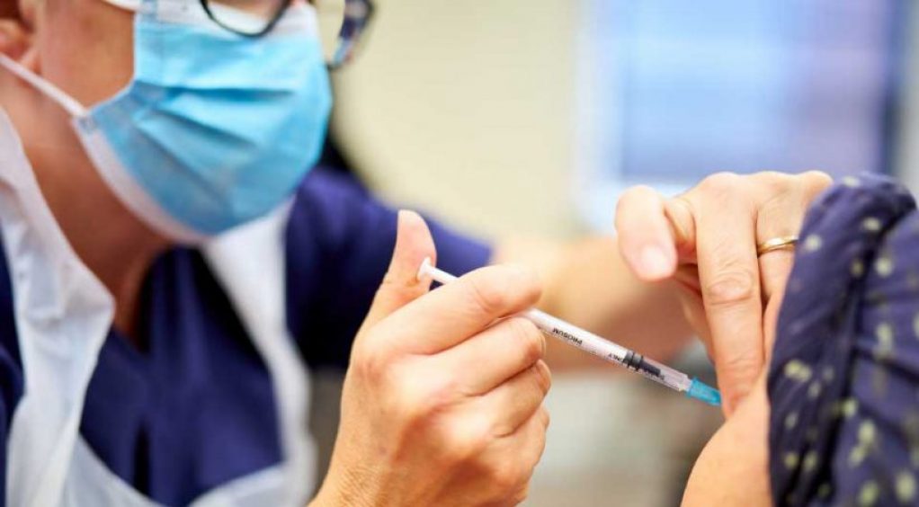 Nurse giving an injection