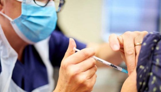 Nurse giving an injection