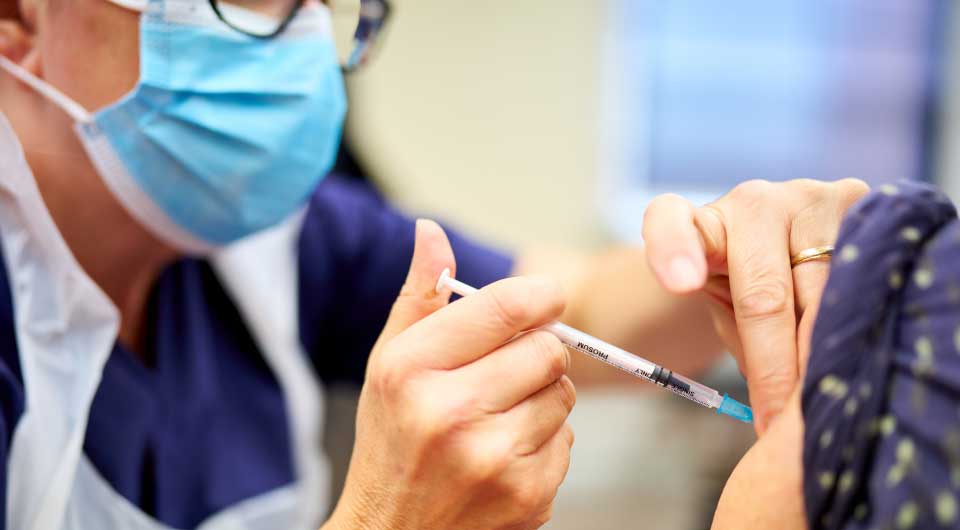 Nurse giving an injection