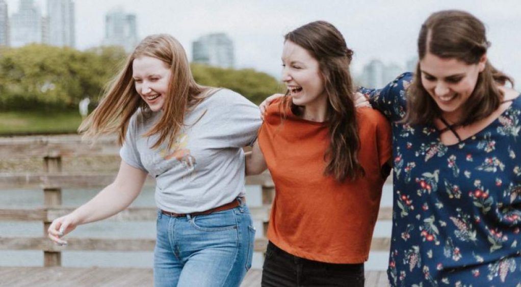 Image of women supporting each other; Photo by Priscilla Du Preez on Unsplash